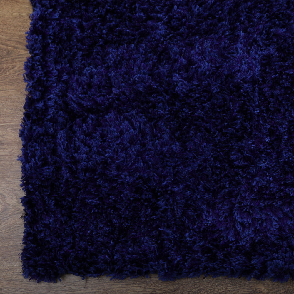 hand-tufted-shag-polyester-area-rug-solid-blue-closeup 2