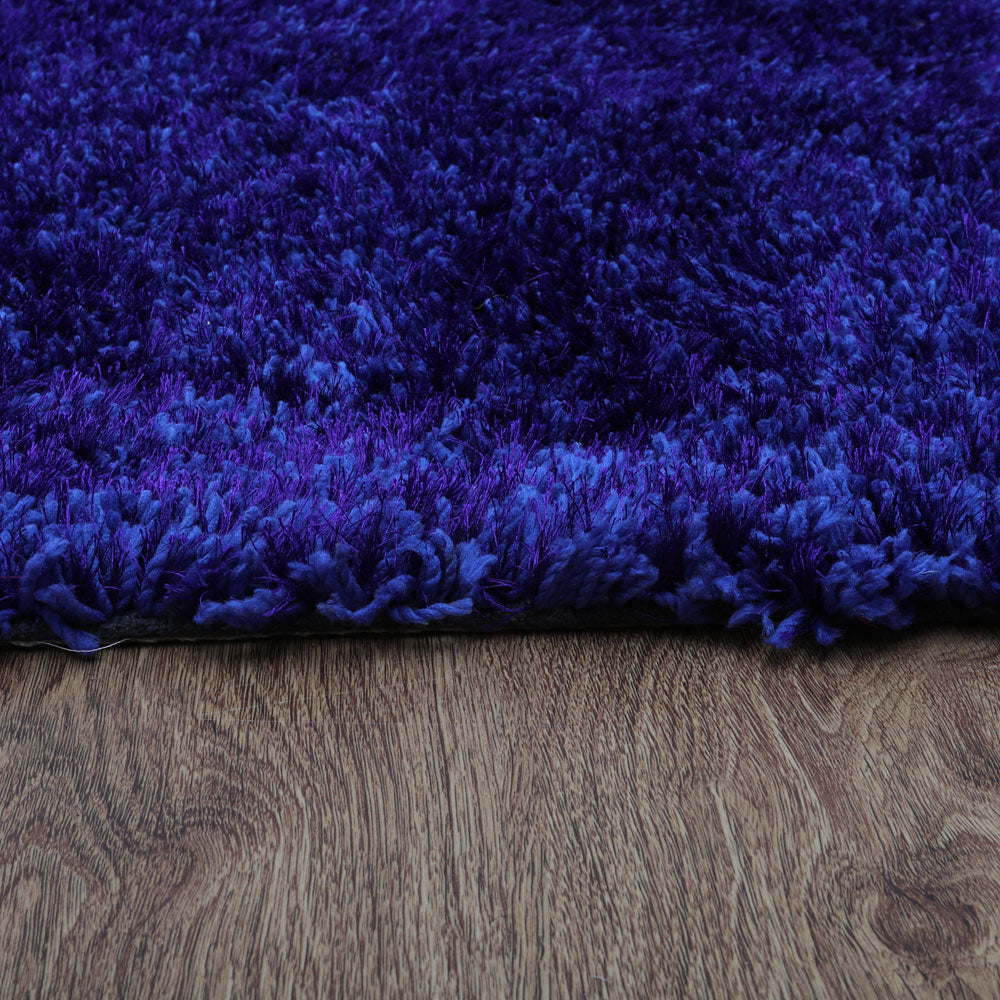 hand-tufted-shag-polyester-area-rug-solid-blue-closeup 3