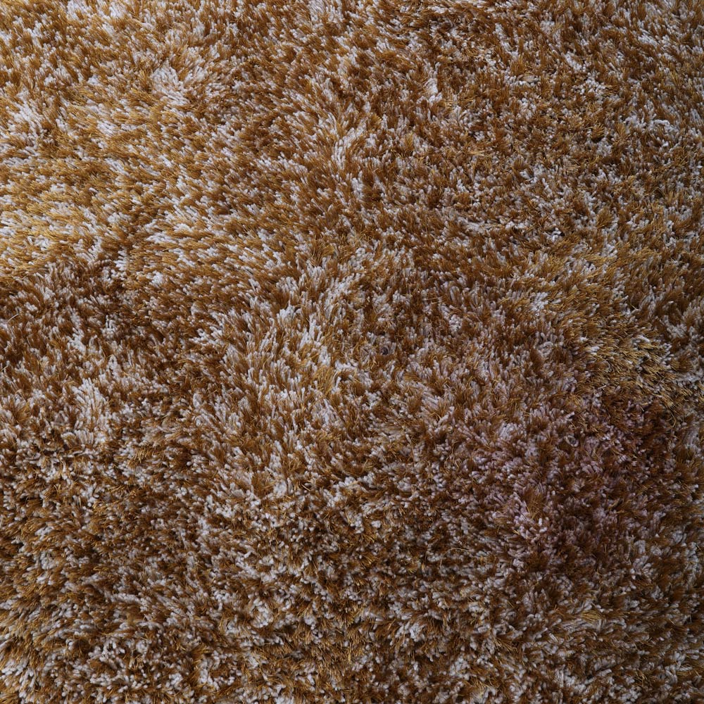 hand-tufted-shag-polyester-area-rug-solid-gold-closeup 2