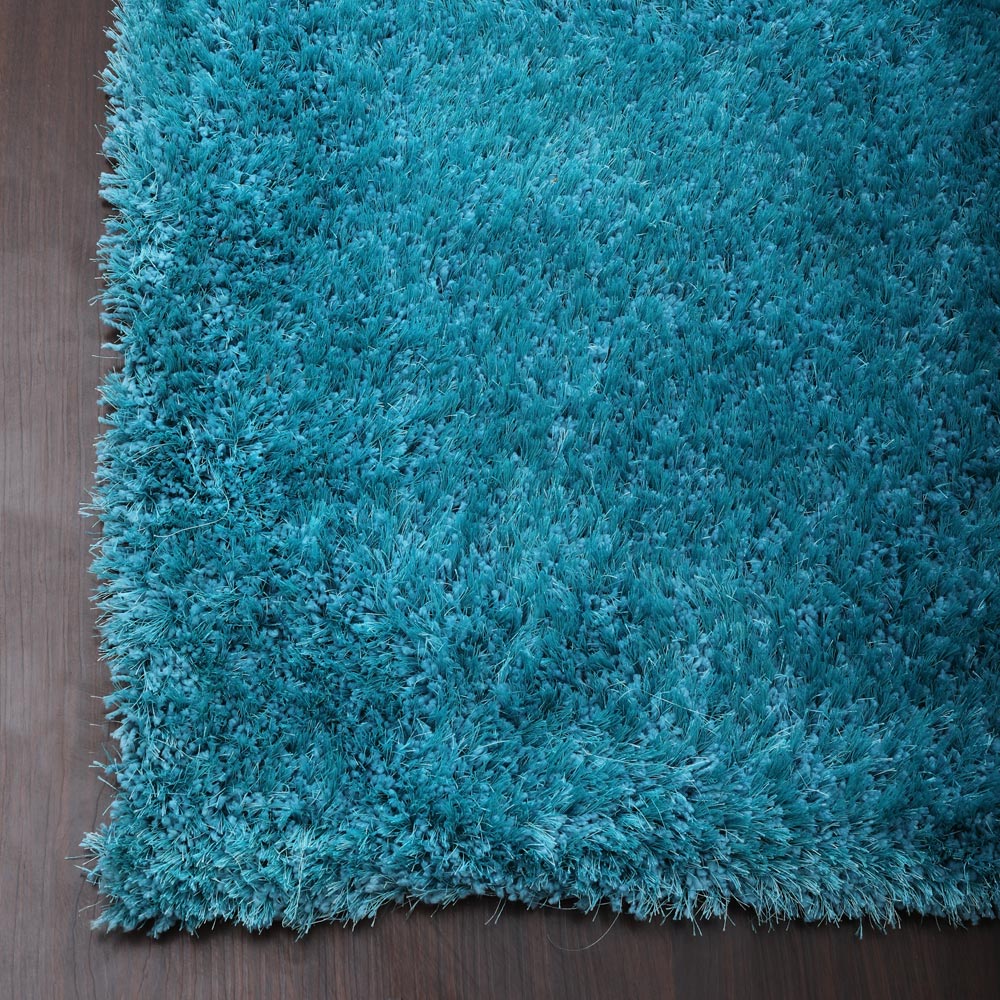 hand-tufted-shag-polyester-solid-turquoise-rectangle-rug-closeup-2