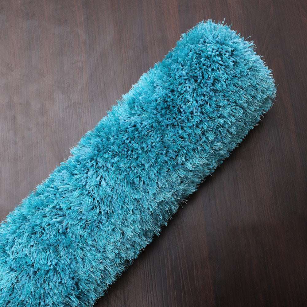 hand-tufted-shag-polyester-solid-turquoise-rectangle-rug-closeup-4