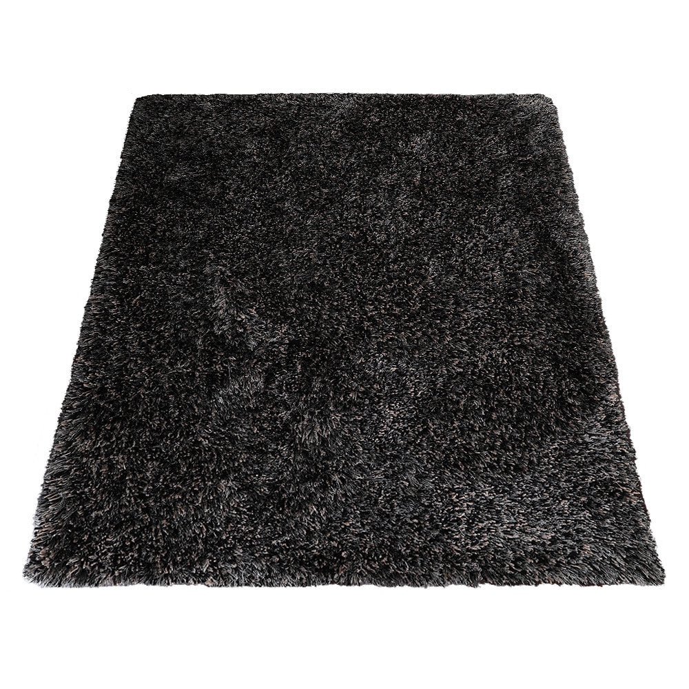 hand-tufted-shag-polyester-area-rug-solid-black-silver-side 1