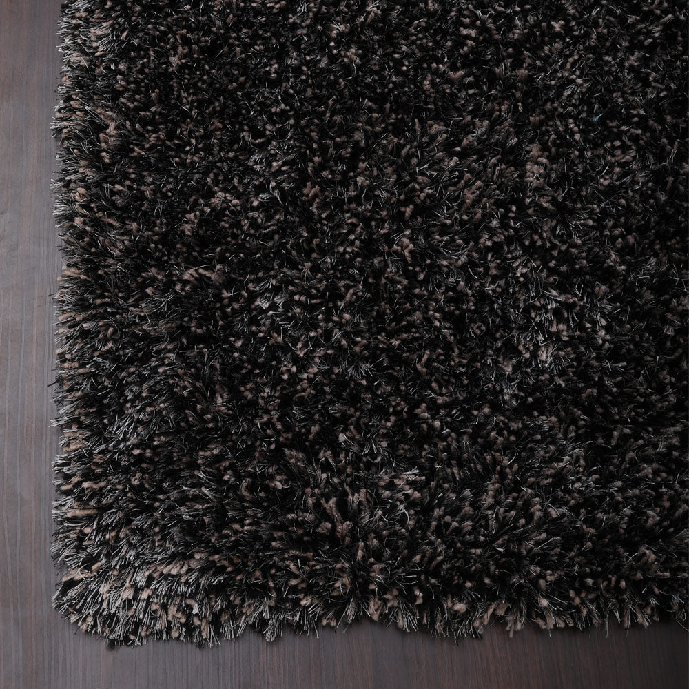 hand-tufted-shag-polyester-area-rug-solid-black-silver-closeup 1