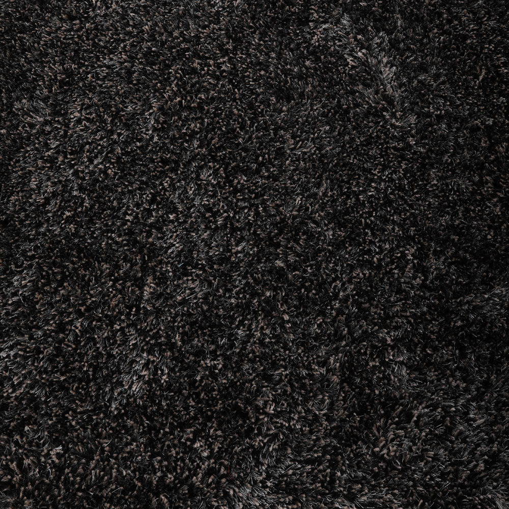 hand-tufted-shag-polyester-area-rug-solid-black-silver-closeup 2