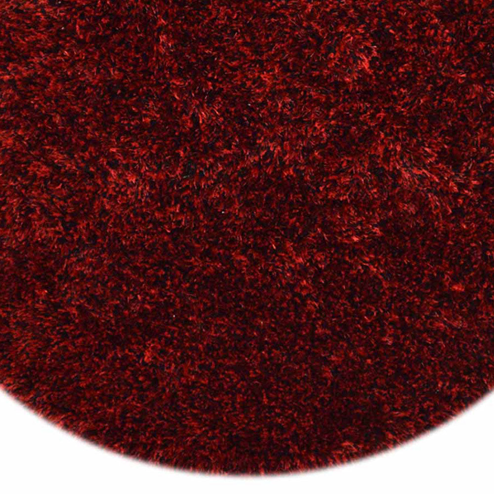 hand-tufted-shag-polyester-solid-red-black-round-rug-closeup-1