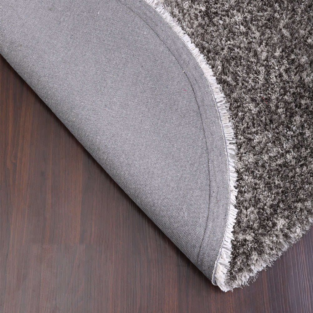 hand-tufted-shag-polyester-solid-silver-white-round-rug-closeup-5