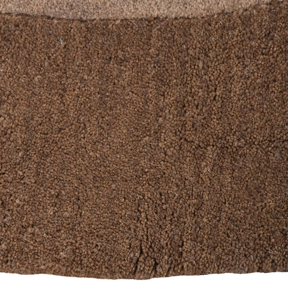 hand-tufted-wool-round-rug-contemporary-beige-brown-closeup-2