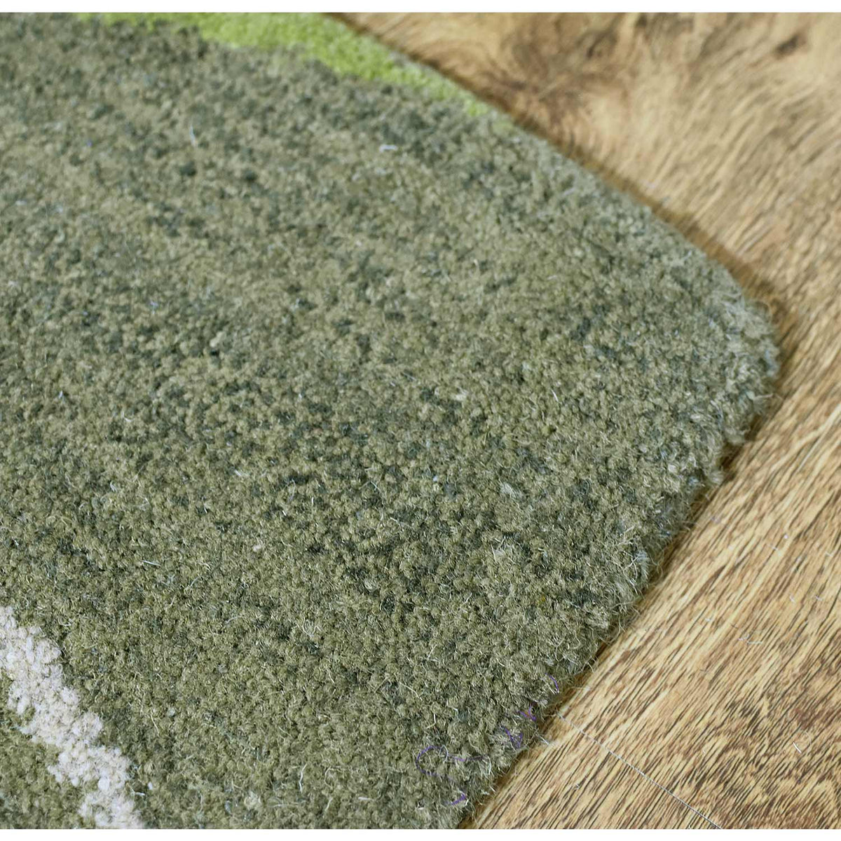 hand-tufted-wool-area-rug-abstract-green-closeup-3