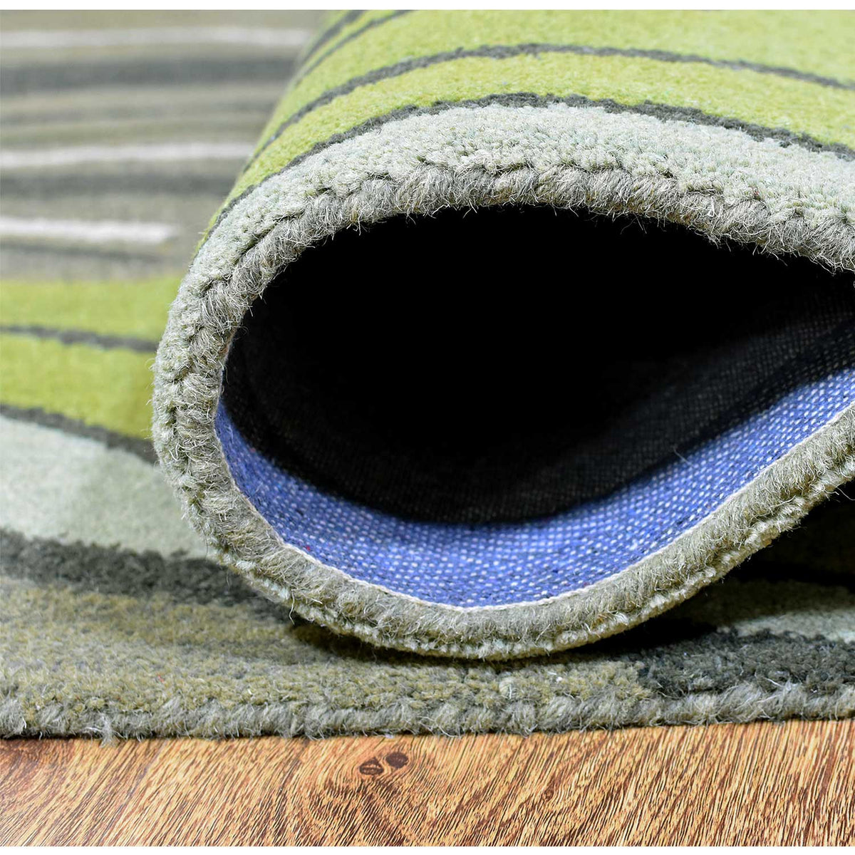 hand-tufted-wool-area-rug-abstract-green-closeup-4