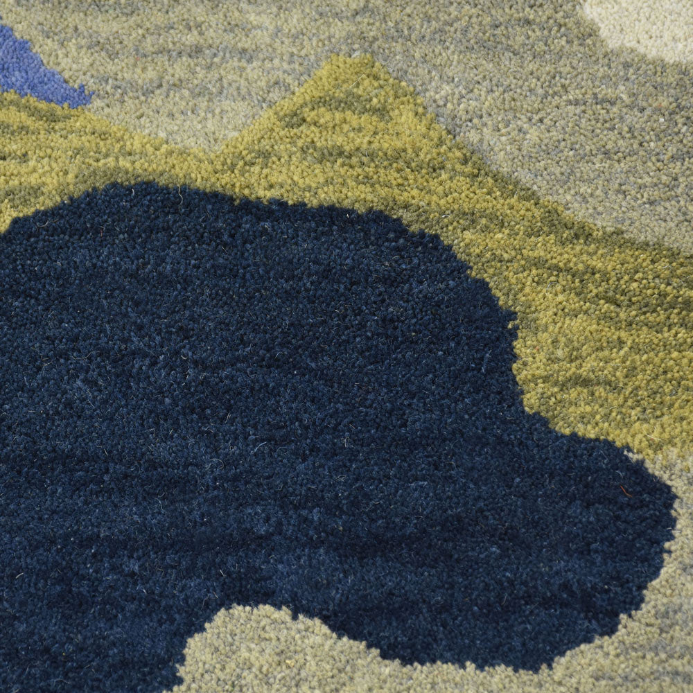 hand-knotted-wool-abstract-multicolor-round-rug-closeup-1