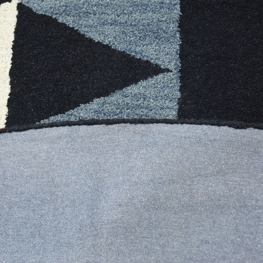 hand-knotted-wool-geometric-multicolor-round-rug-closeup-3