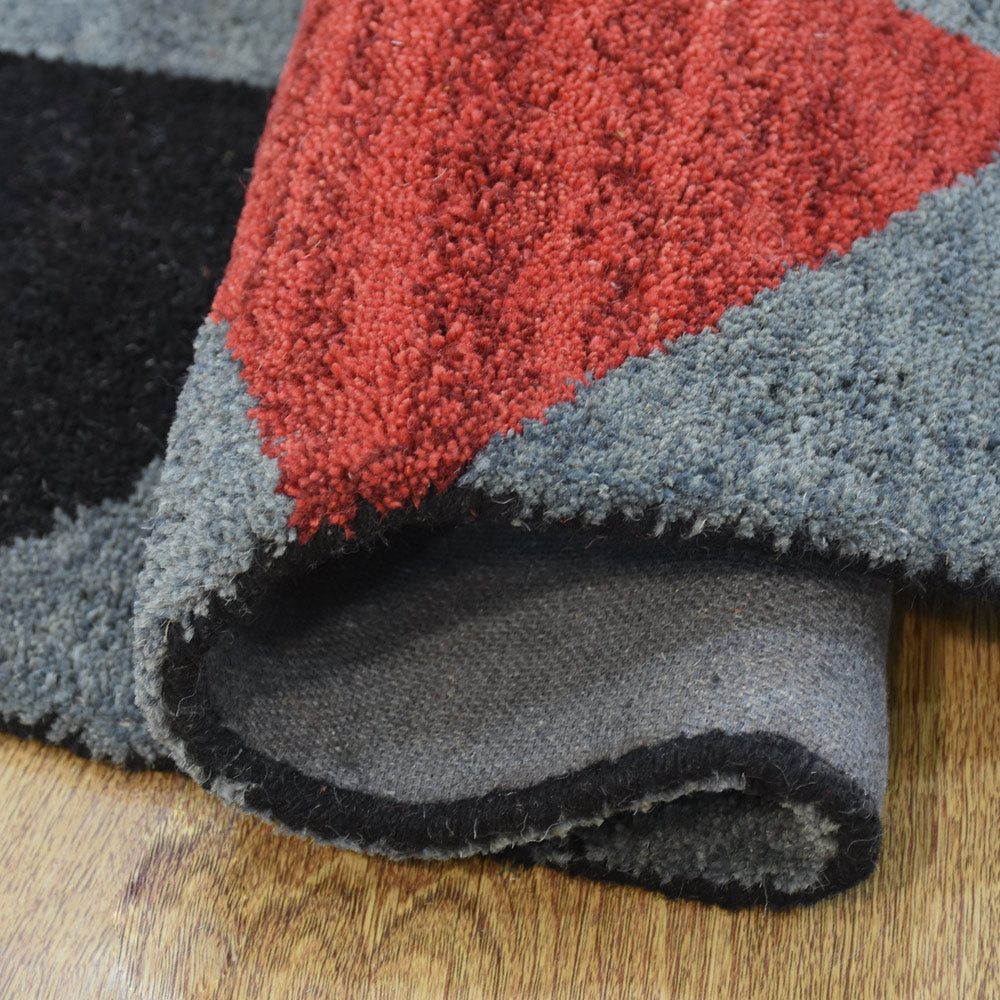 hand-knotted-wool-geometric-multicolor-round-rug-closeup-5