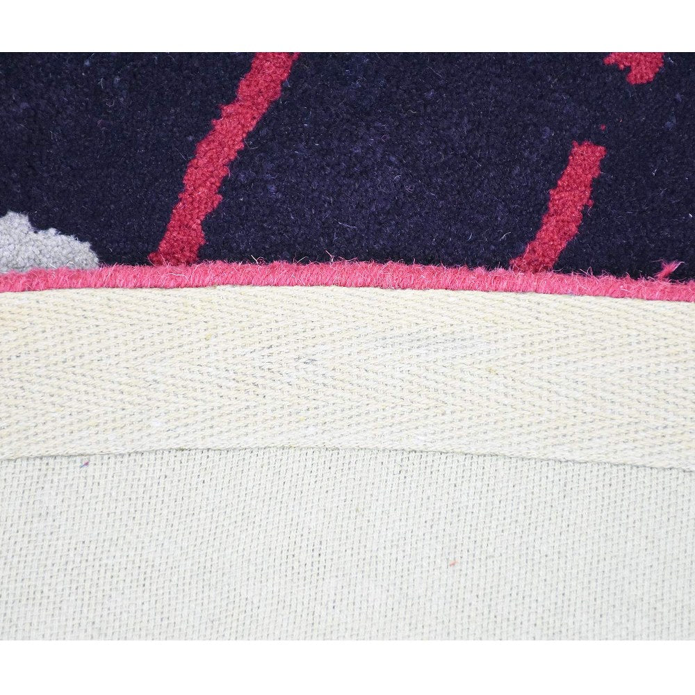 hand-tufted-wool-round-area-rug-contemporary-multicolor-closeup 3