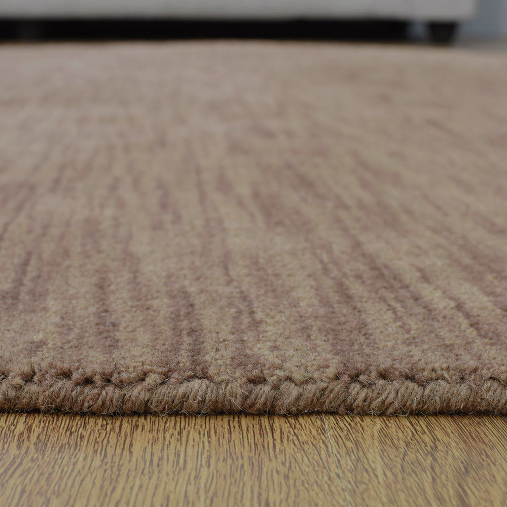 hand-knotted-loom-wool-solid-light-brown-round-rug-closeup-4