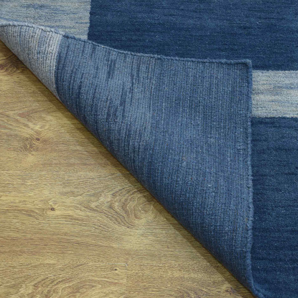 hand-knotted-wool-contemporary-light-blue-rectangle-rug-closeup-3