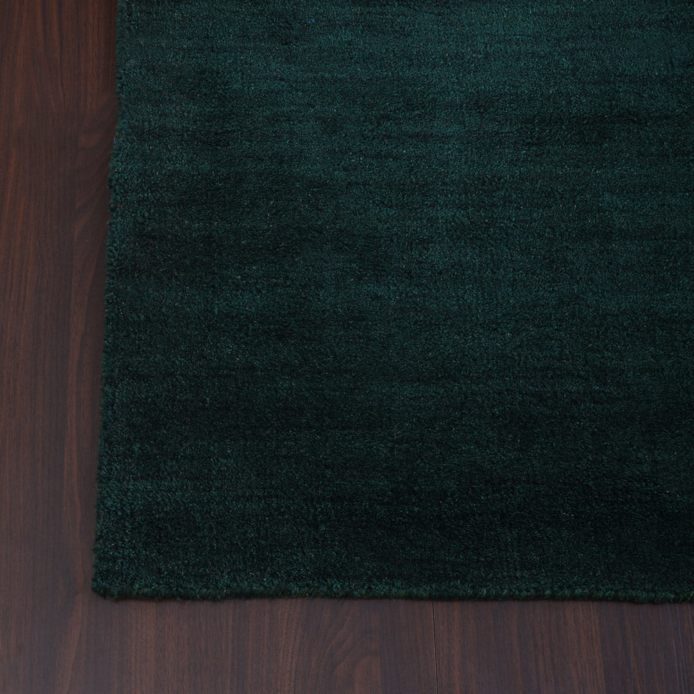 hand-knotted-loom-silk-runner-area-rug-solid-dark-green-closeup 2