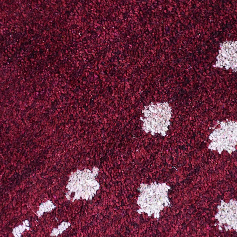 hand-knotted-silk-area-rug-contemporary-dark-red-closeup 1
