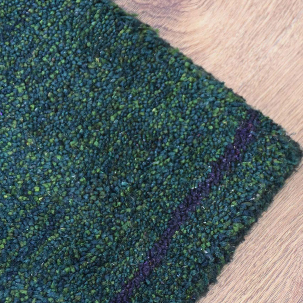 hand-knotted-silk-contemporary-dark-green-rug-closeup 2
