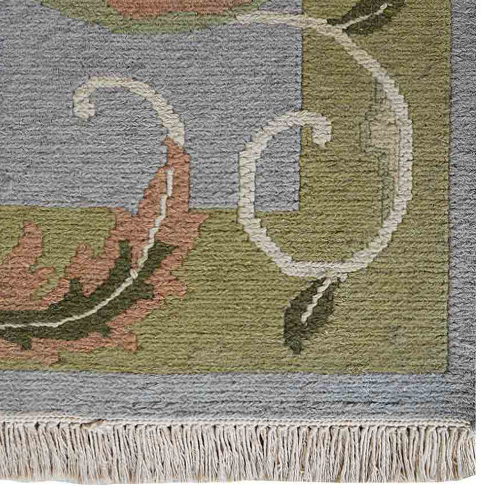 hand-knotted-sumak-wool-floral-area-rug-side-closeup-1
