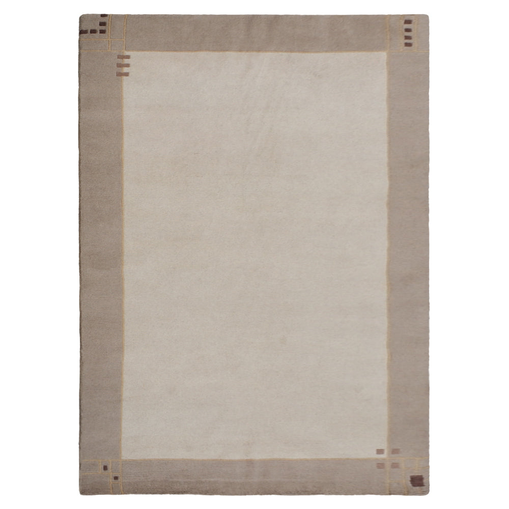 hand-knotted-tibbati-wool-beige-area-rug-side-1