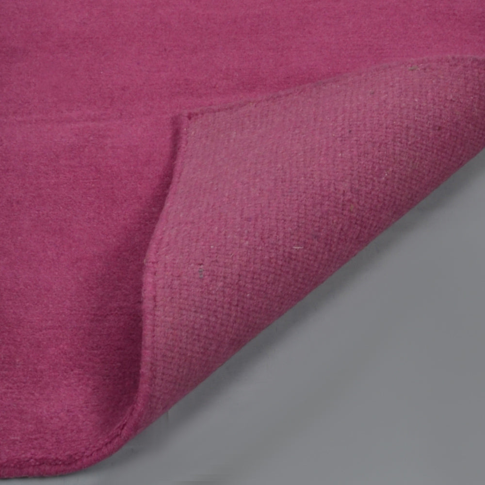 hand-knotted-tibbati-wool-area-rug-solid-pink-closeup-1