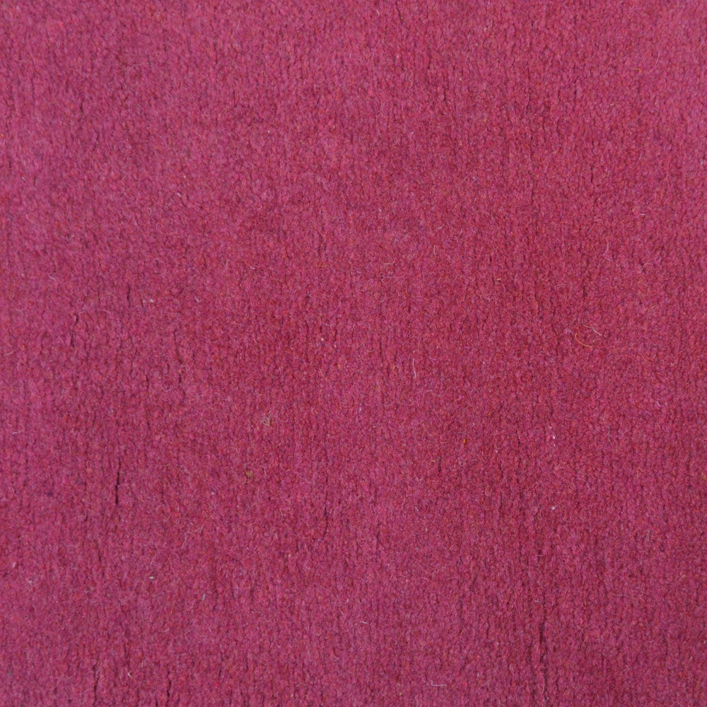 hand-knotted-tibbati-wool-area-rug-solid-pink-closeup-3