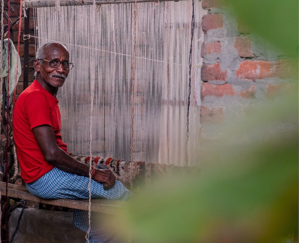 A master weaver at his loom in India