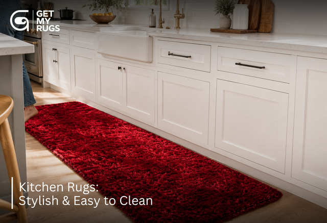 Deep red runner rug in a bright modern kitchen with white cabinetry and a farmhouse sink