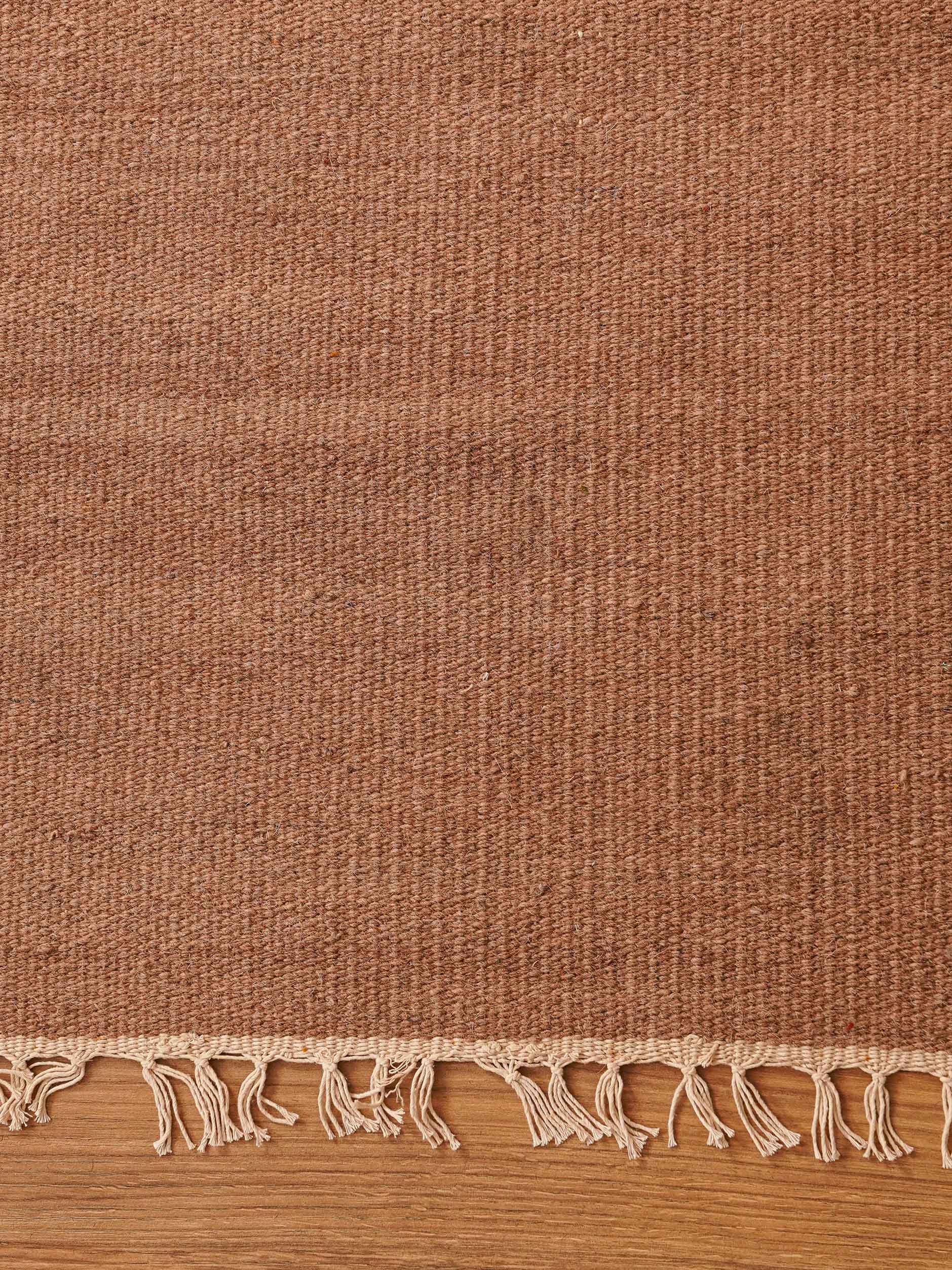 hand-woven-flat-weave-wool-solid-light-brown-rug-closeup-1