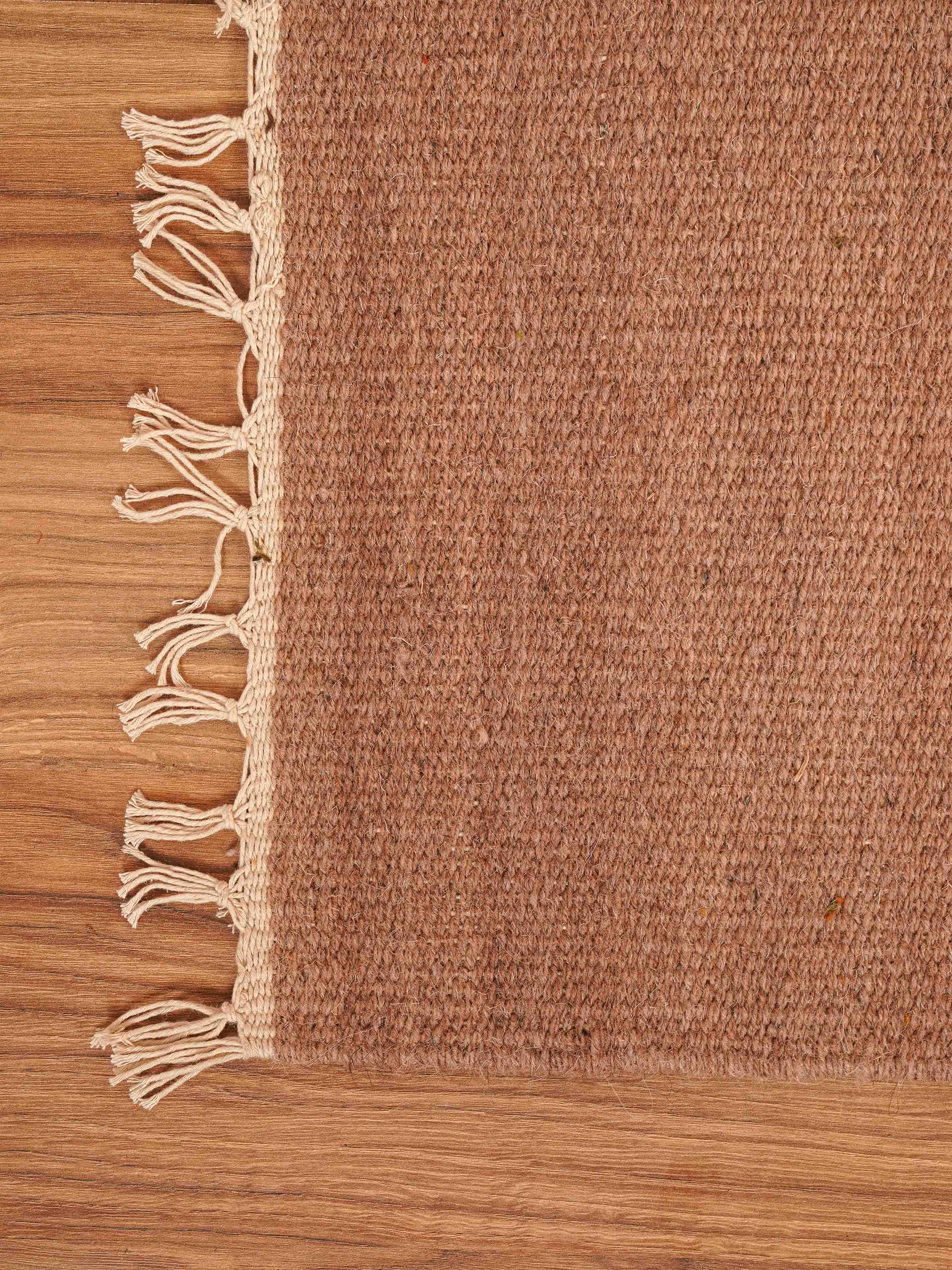 hand-woven-flat-weave-wool-solid-light-brown-rug-closeup-3