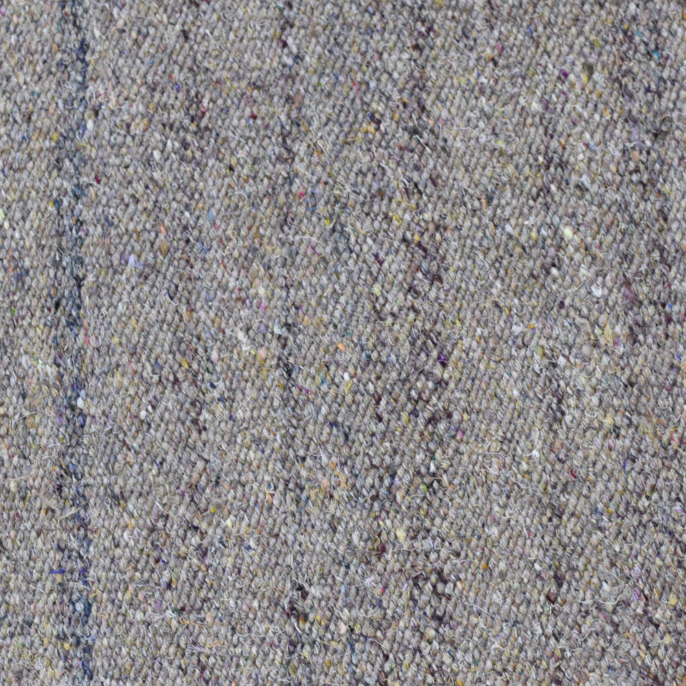 hand-woven-flat-weave-polyester-solid-beige-rug-closeup-1