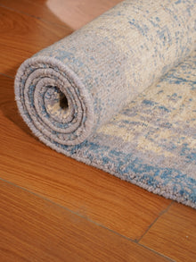 Abstract Canvas-Style Area Rug in Muted Beige & Blue