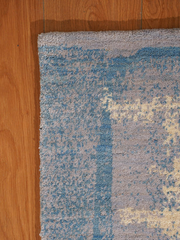 Abstract Canvas-Style Area Rug in Muted Beige & Blue
