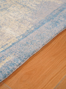 Abstract Canvas-Style Area Rug in Muted Beige & Blue
