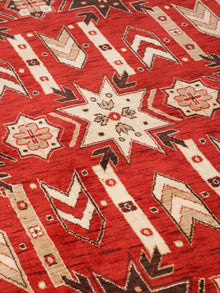 Handmade Red and Cream Wool Area Rug