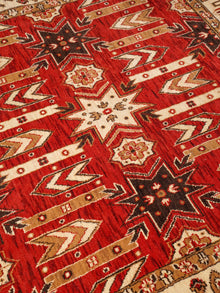 Handmade Red and Cream Wool Area Rug