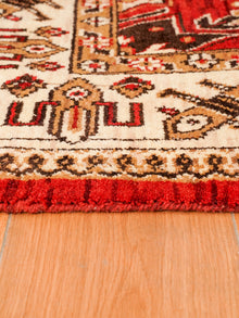 Handmade Red and Cream Wool Area Rug