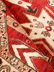 Handmade Red and Cream Wool Area Rug