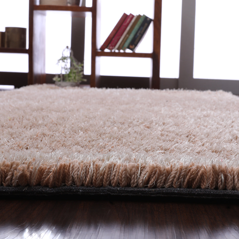 hand-tufted-shag-polyester-area-rug-solid-beige-closeup 3