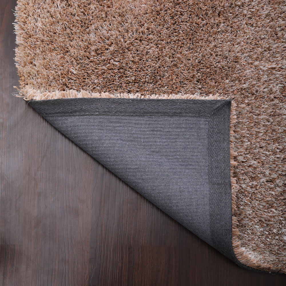 hand-tufted-shag-polyester-area-rug-solid-beige-closeup 5
