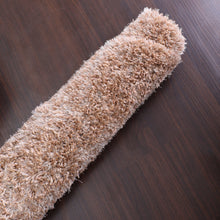 hand-tufted-shag-polyester-round-rug-solid-beige-closeup 4