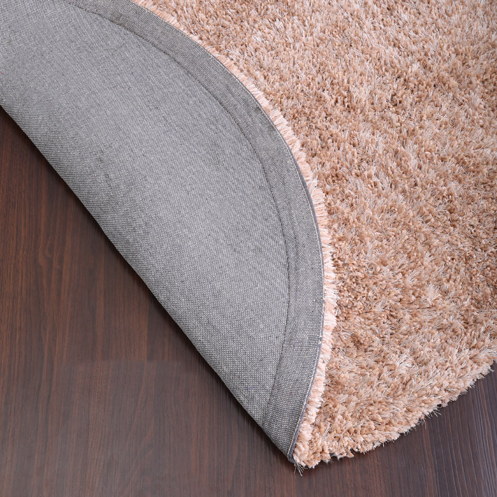 hand-tufted-shag-polyester-round-rug-solid-beige-closeup 5