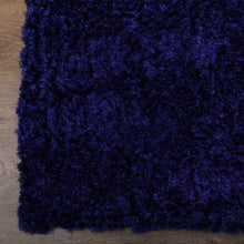 hand-tufted-shag-polyester-area-rug-solid-blue-closeup 2