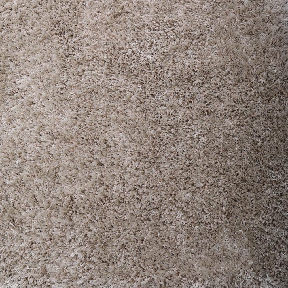 hand-tufted-shag-polyester-area-rug-solid-ivory-closeup-1
