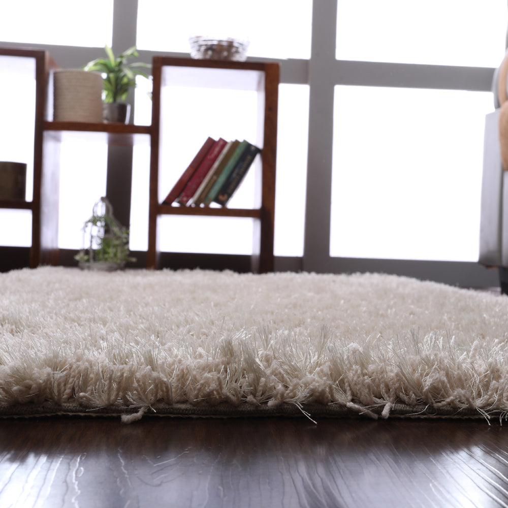 hand-tufted-shag-polyester-area-rug-solid-ivory-closeup-3