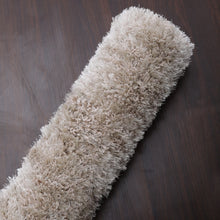 hand-tufted-shag-polyester-area-rug-solid-ivory-closeup-4