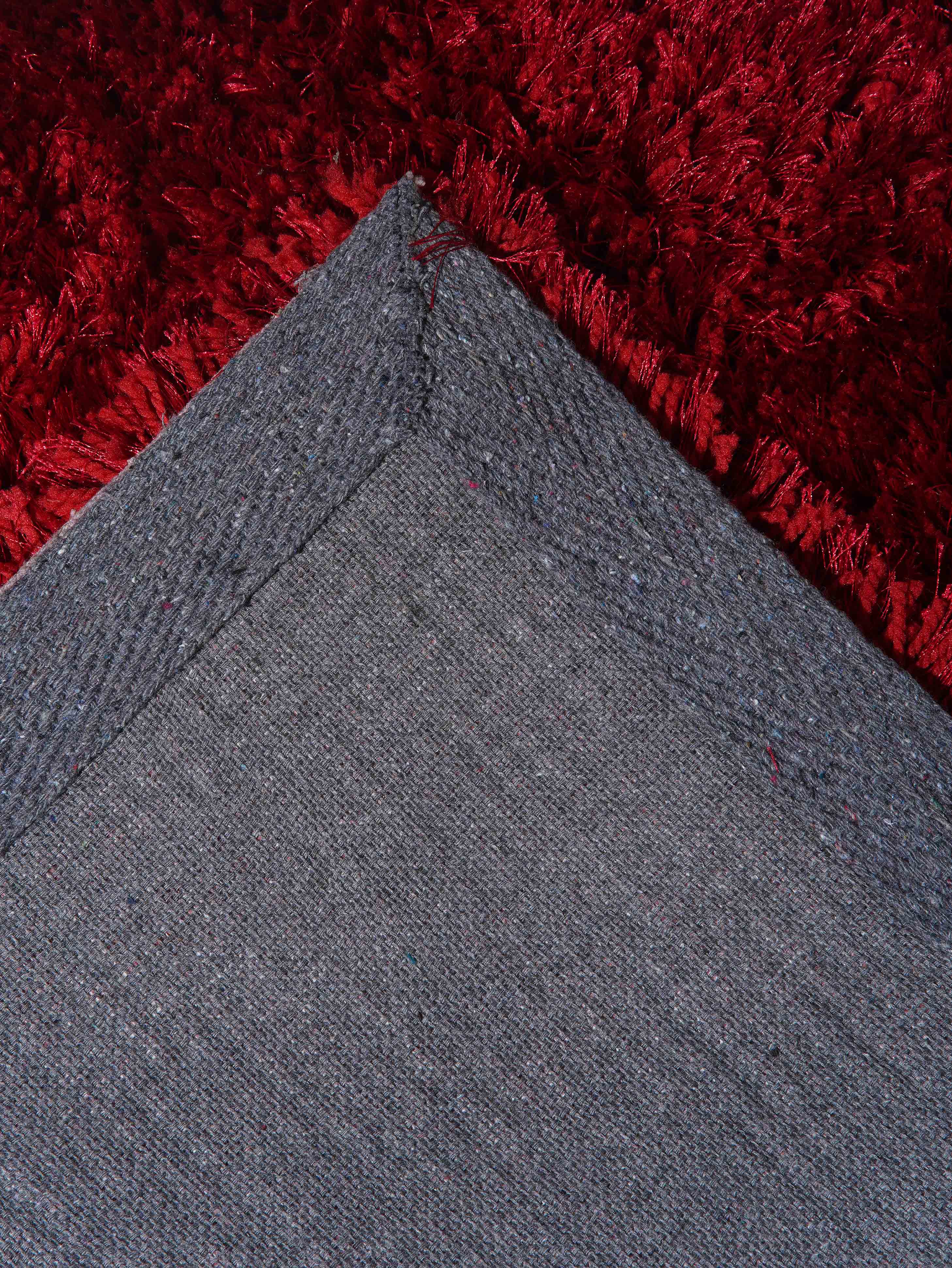 hand-tufted-solid-polyester-runner-red-rug-closeup-1