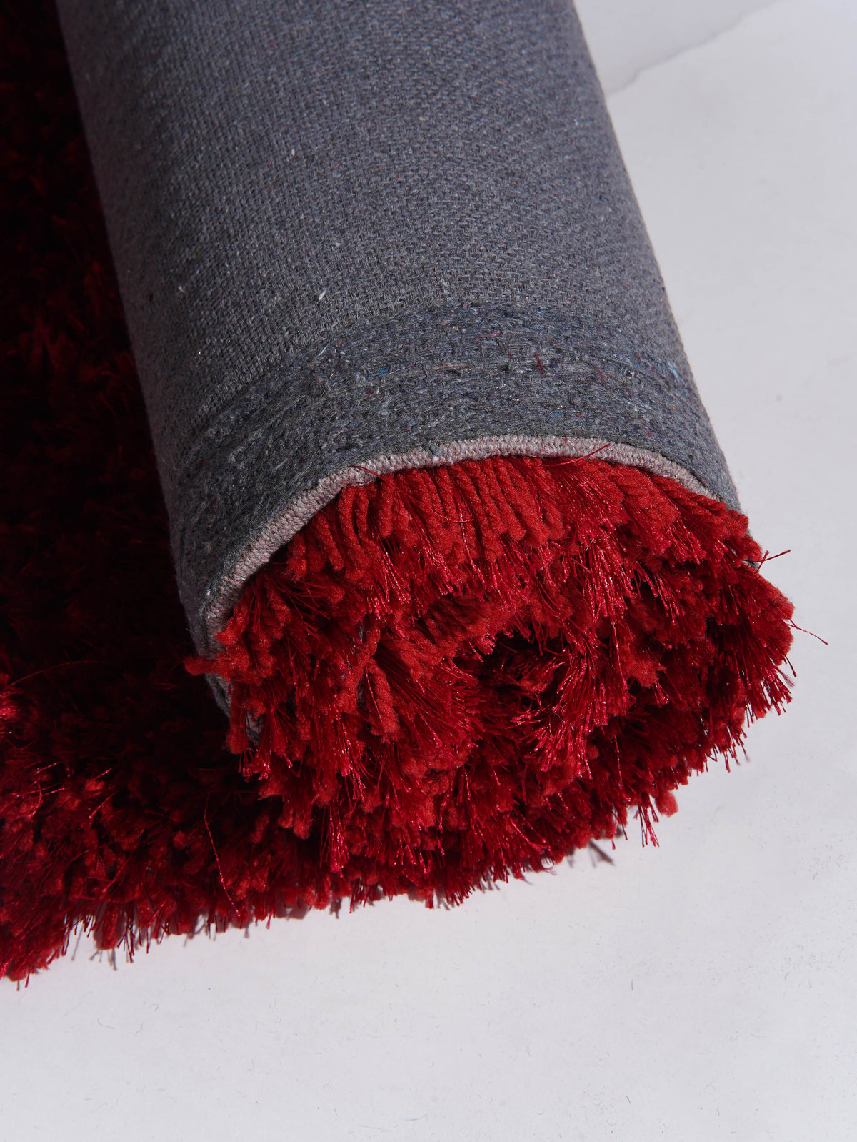 hand-tufted-solid-polyester-runner-red-rug-closeup-3