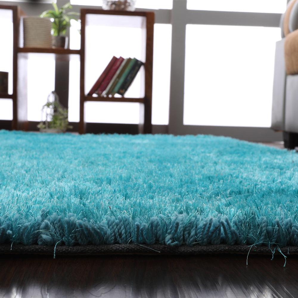 hand-tufted-shag-polyester-solid-turquoise-rectangle-rug-closeup-3