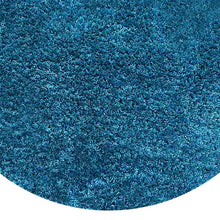 hand-tufted-shag-polyester-solid-turquoise-round-rug-closeup-1